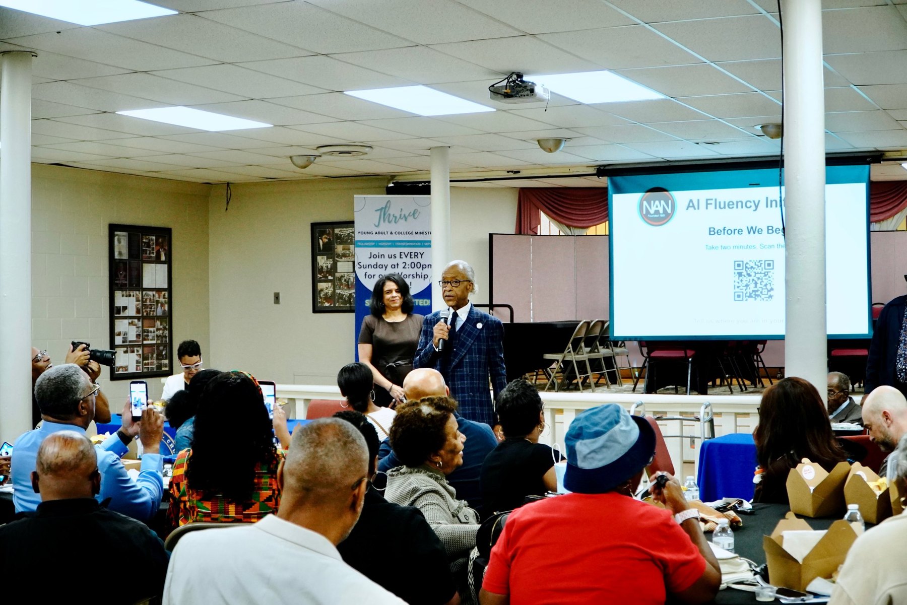 Rev. Al Sharpton and Susan Hearn open the AI Fluency class in Big Bethel A.M.E. Church's fellowship hall, Atlanta, October 25, 2026