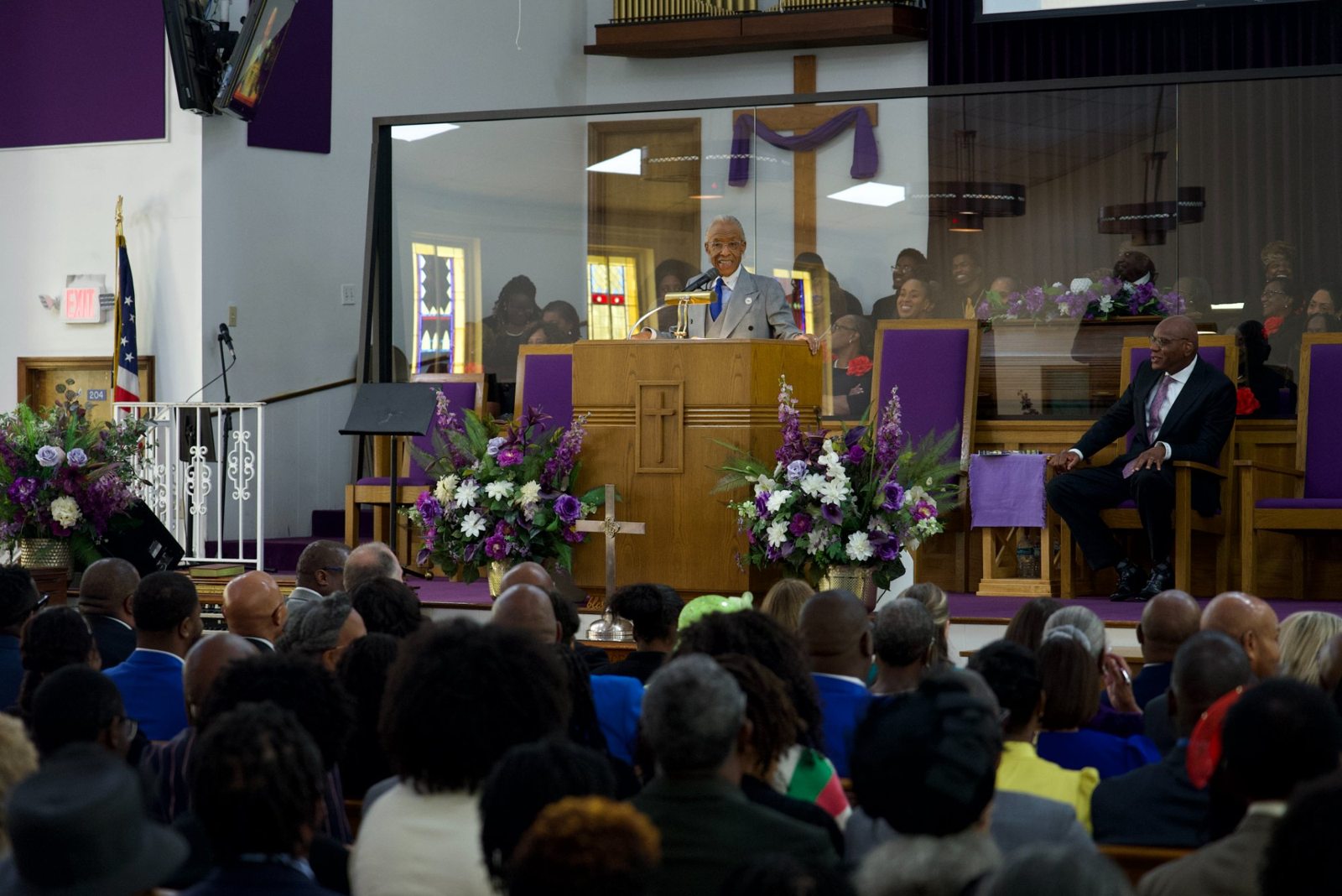 Rev. Al Sharpton at the pulpit before the full congregation at Bethel Missionary Baptist Church