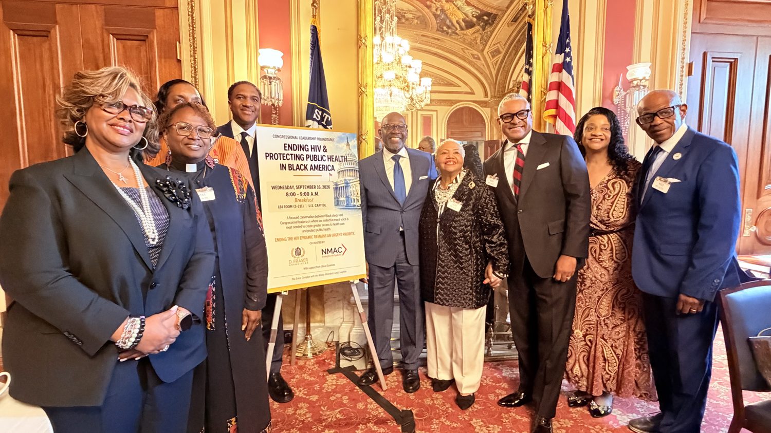 Rev. Nelson Rivers with leaders at the Choose Healthy Life Breakfast, holding an Ending HIV and Protecting Public Health in Black America banner