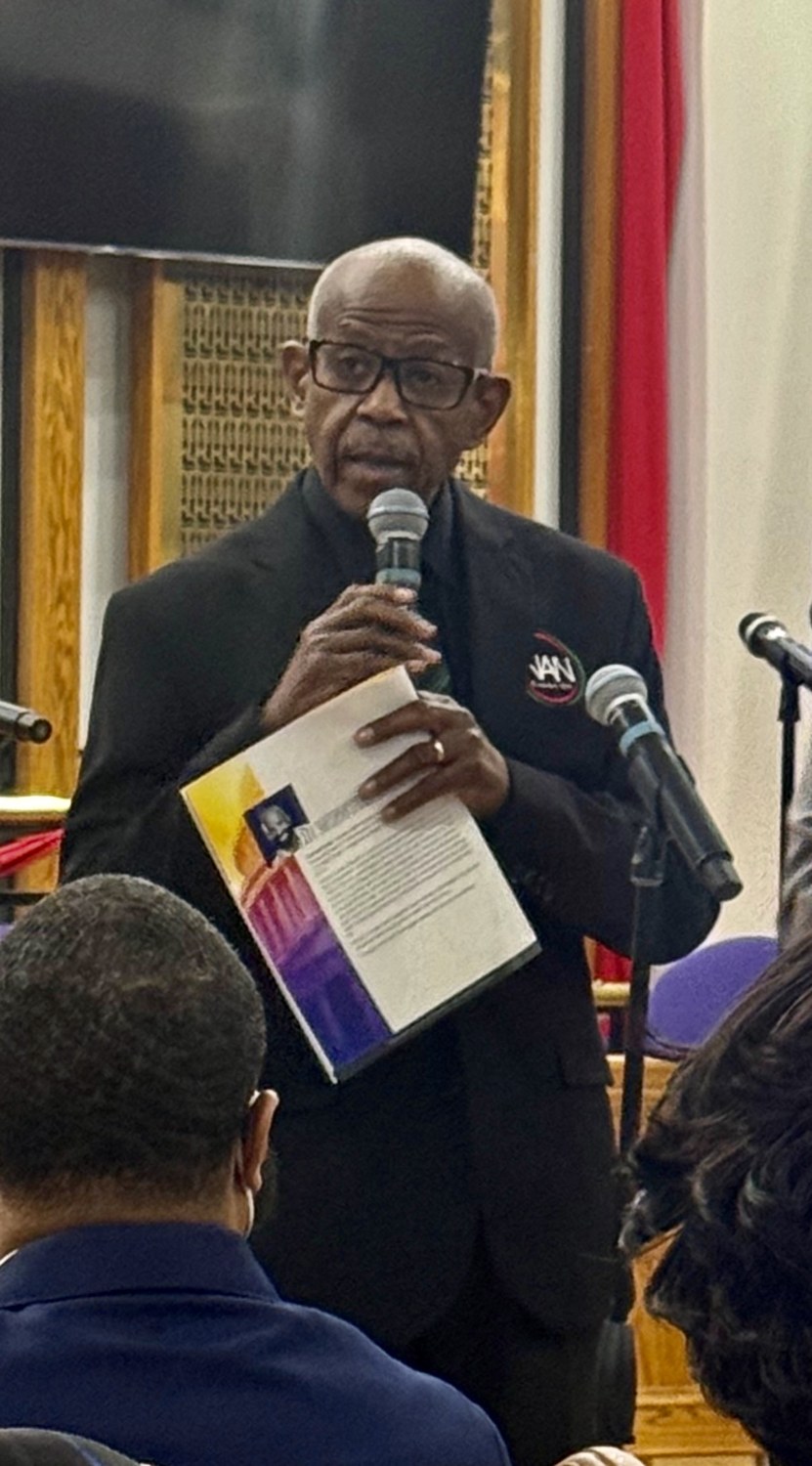Rev. Nelson Rivers delivering the invocation at the Congressional Legislative Gospel Extravaganza
