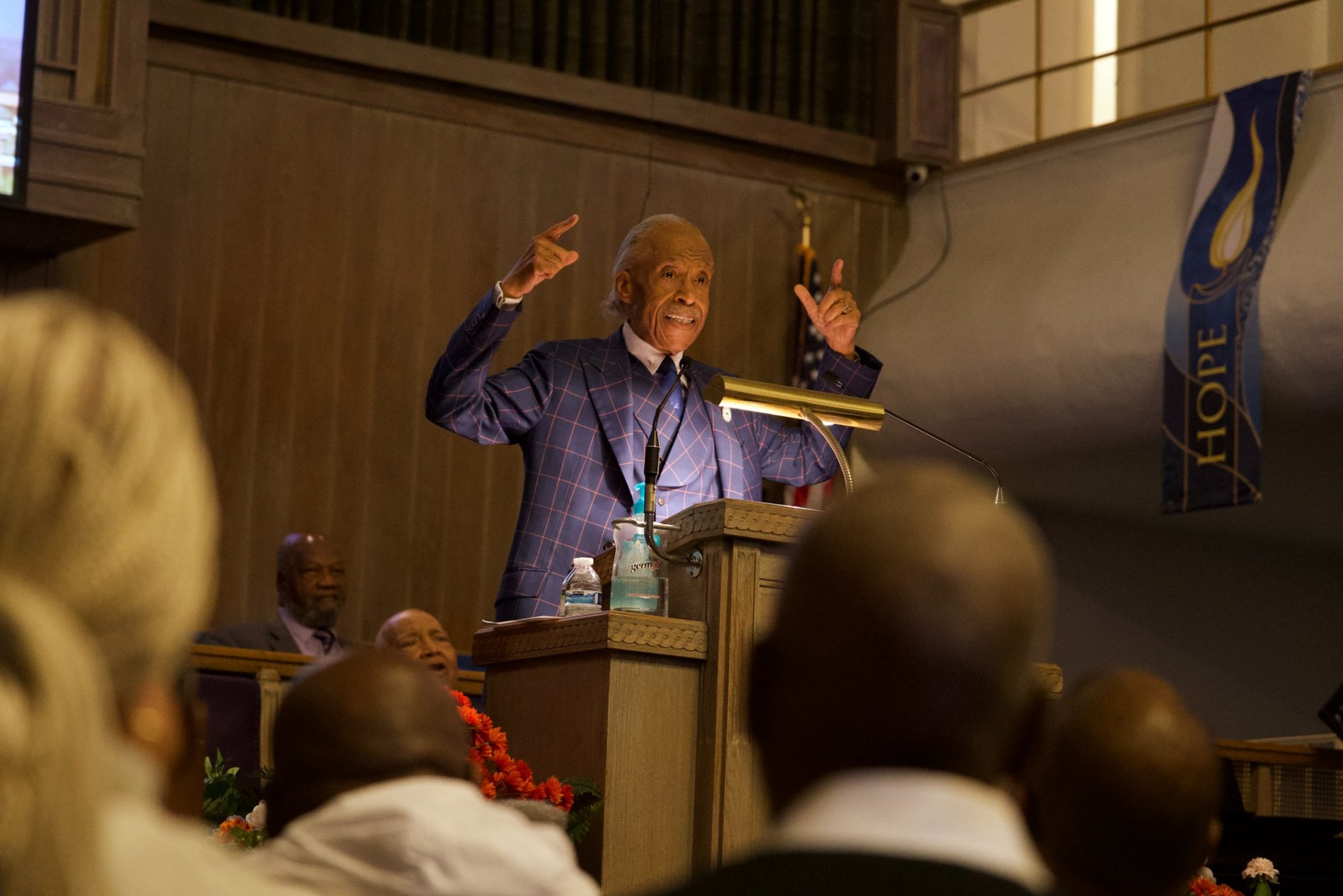 Rev. Al Sharpton stands with 98-year-old Bishop E. T. Caviness Sr. at Greater Abyssinia Baptist Church in Cleveland