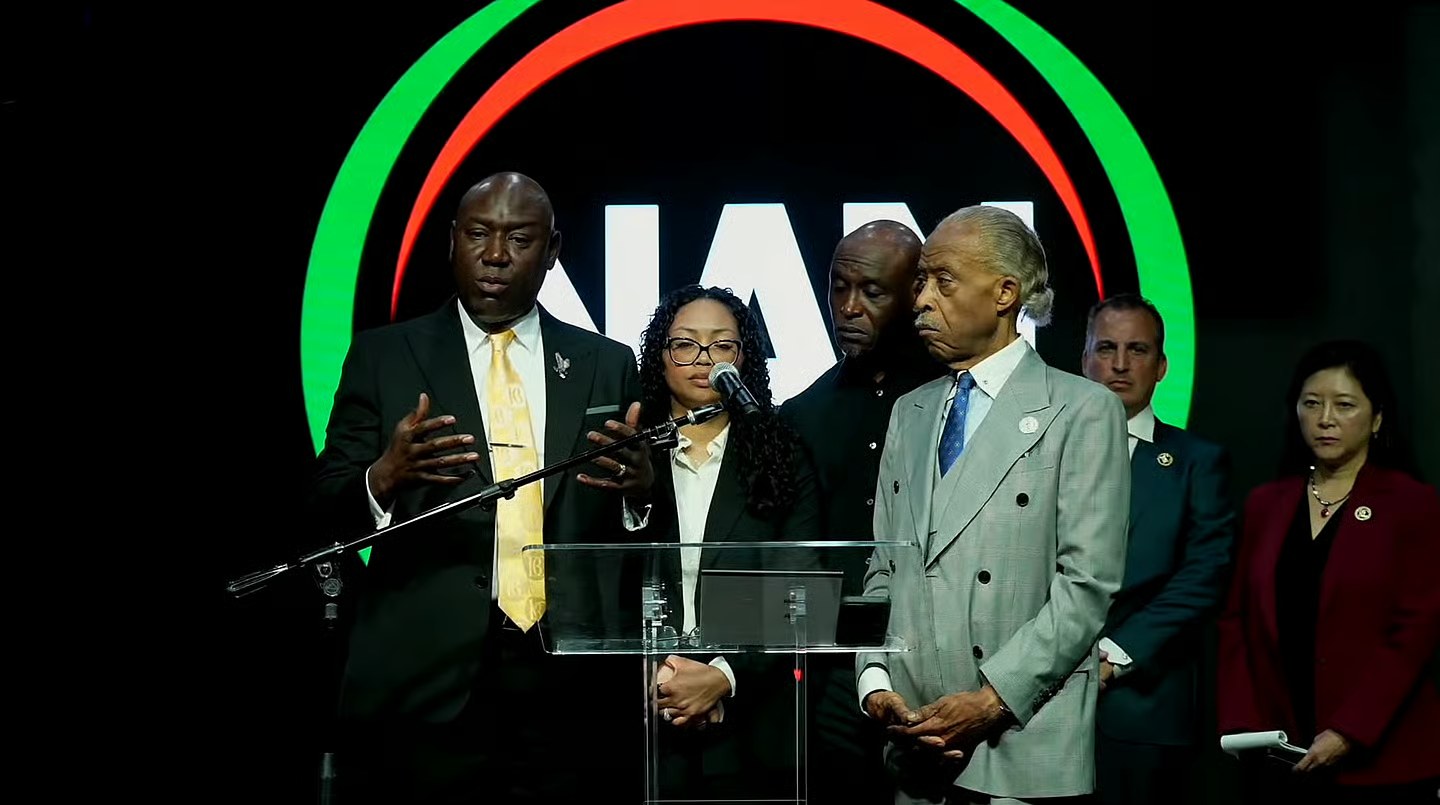 Ben Crump, the Wonsleys and Rev. Al Sharpton at the July 10, 2026 press conference in Harlem