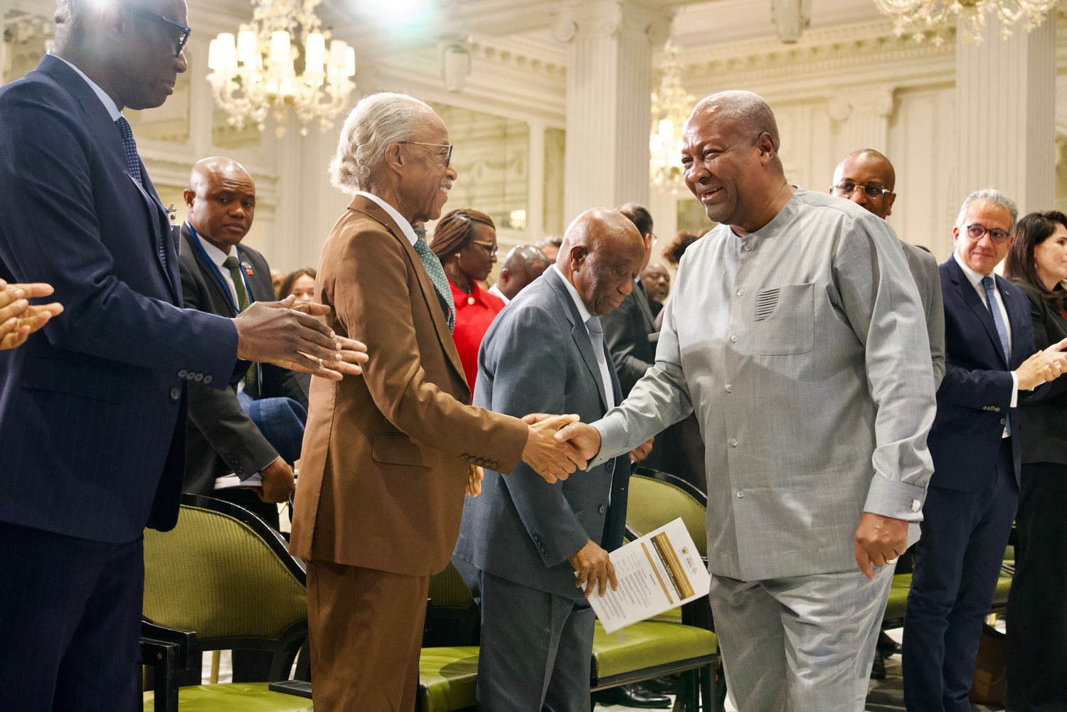 Rev. Al Sharpton greets H.E. Joseph Nyuma Boakai, Sr., President of the Republic of Liberia, at the cultural heritage event