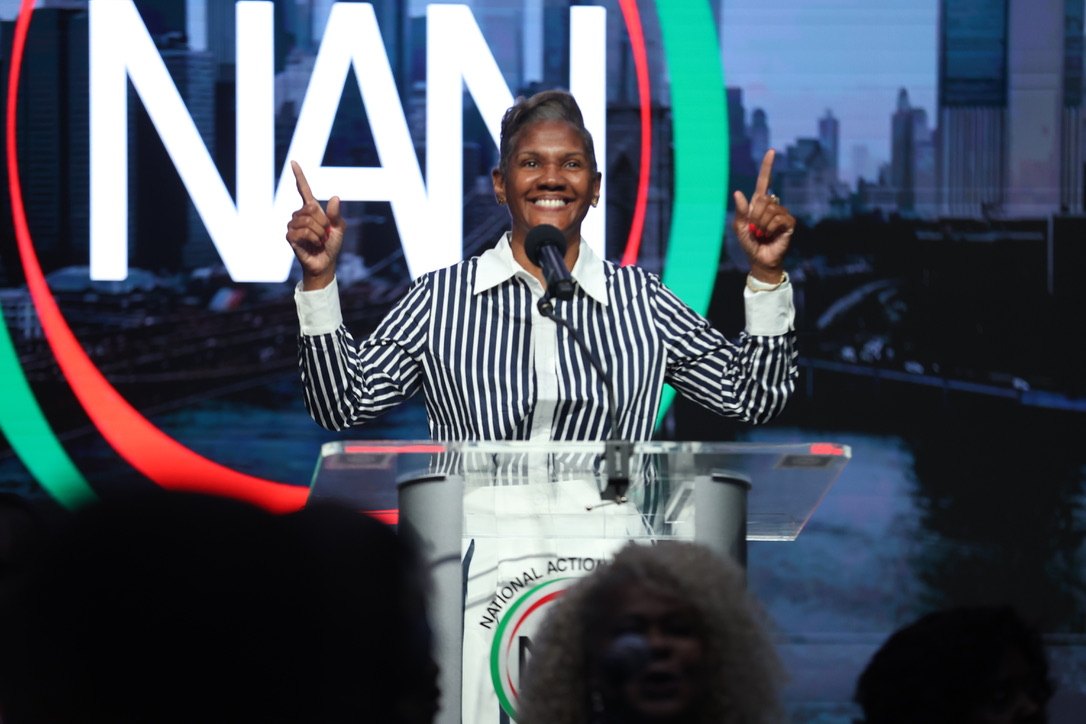 A jubilant member at the NAN podium