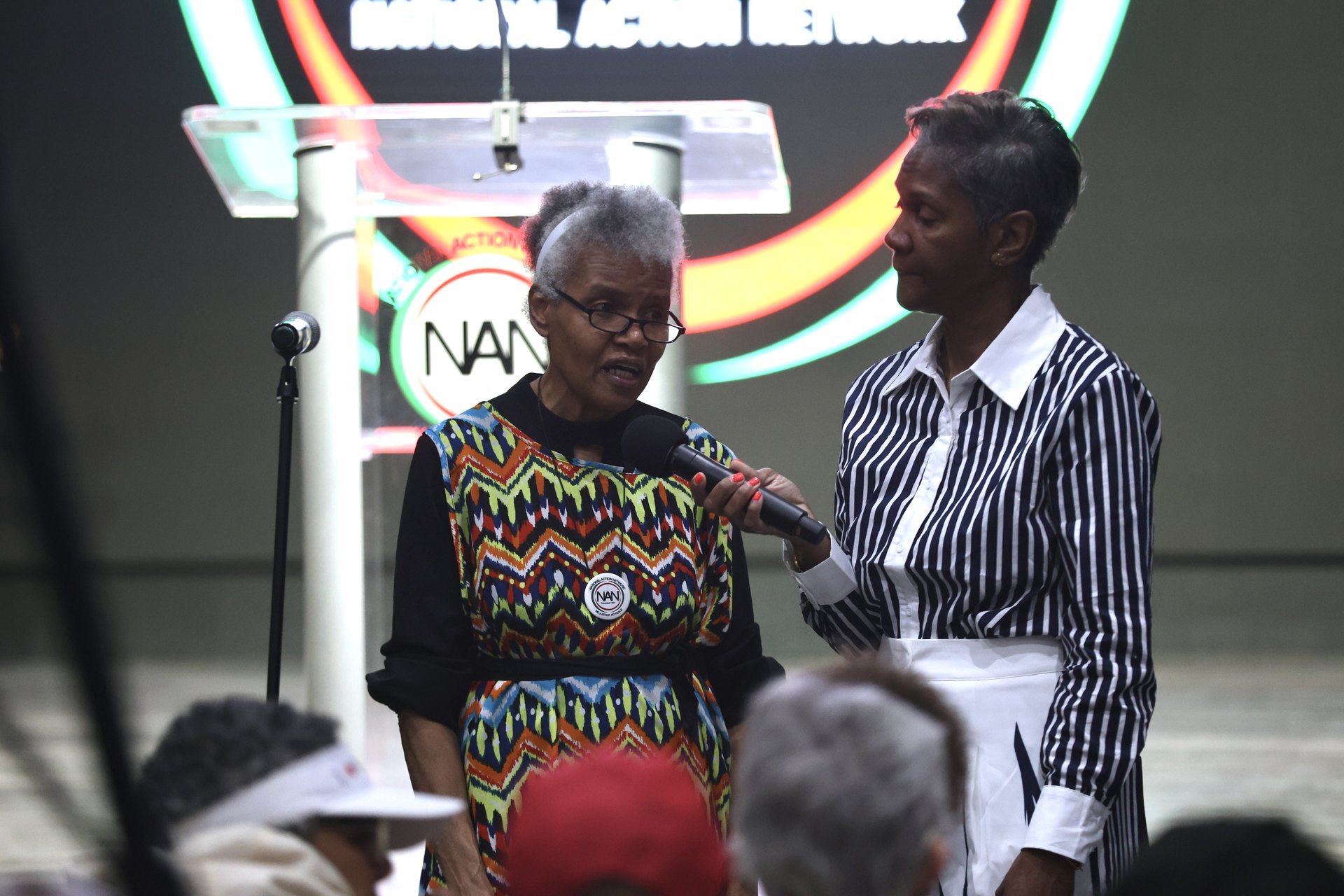 An elder gives testimony from the floor