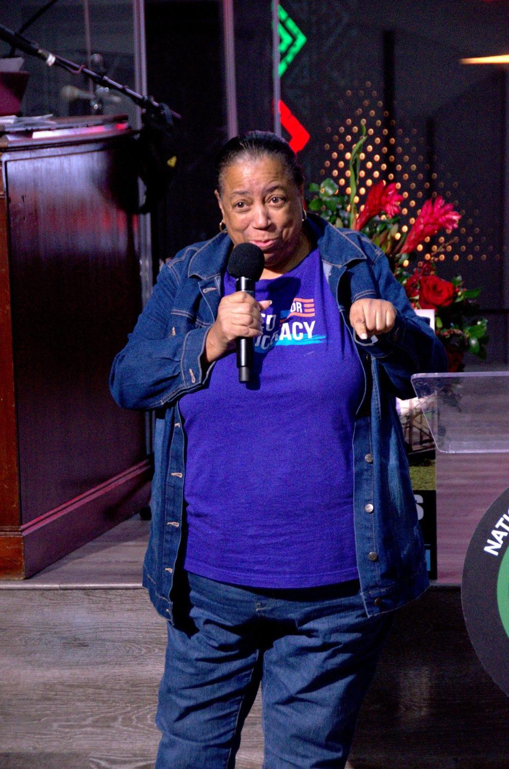 A speaker addresses the Youth Huddle in support of Justice for Nolan