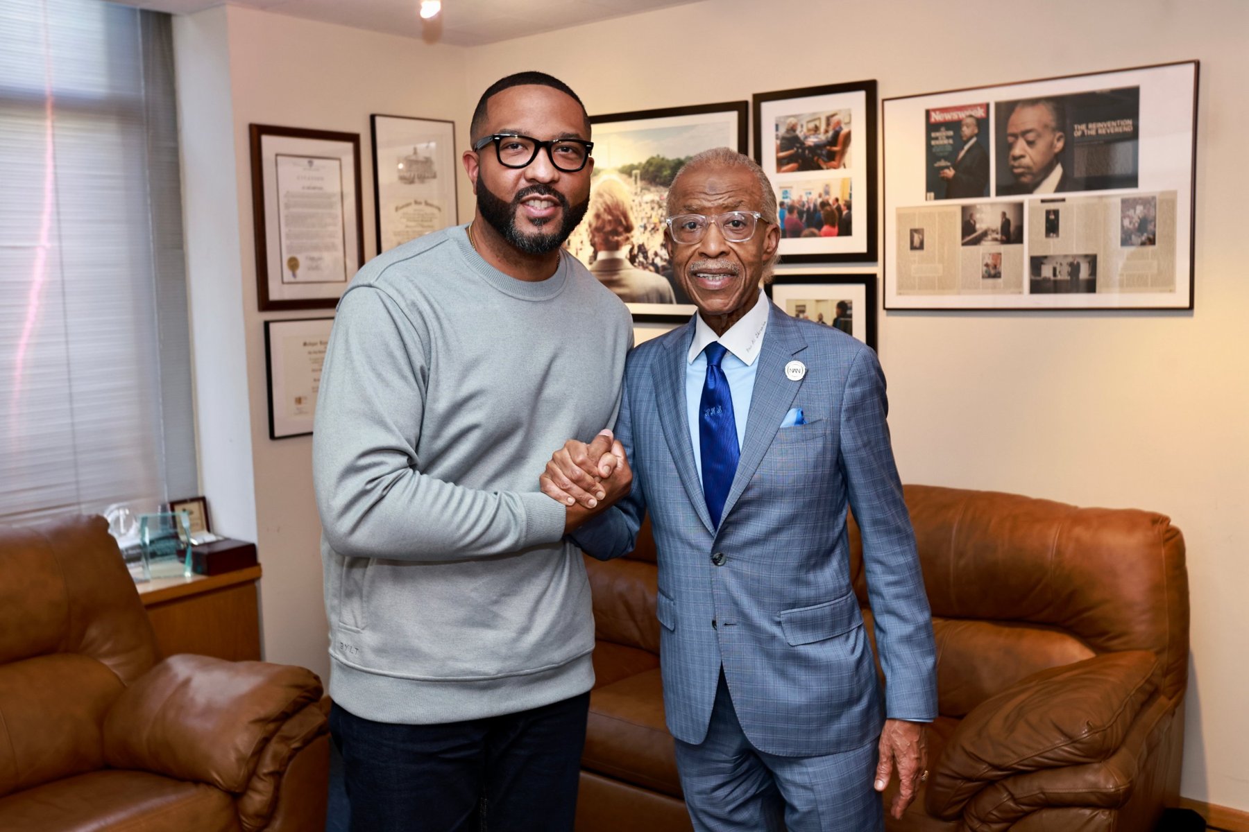 Rev. Al Sharpton welcomes a special guest at National Action Network headquarters