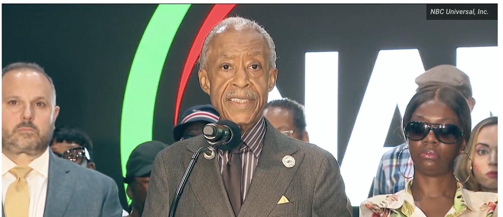 Rev. Al Sharpton speaks at a podium about the Harlem Legionnaires' outbreak