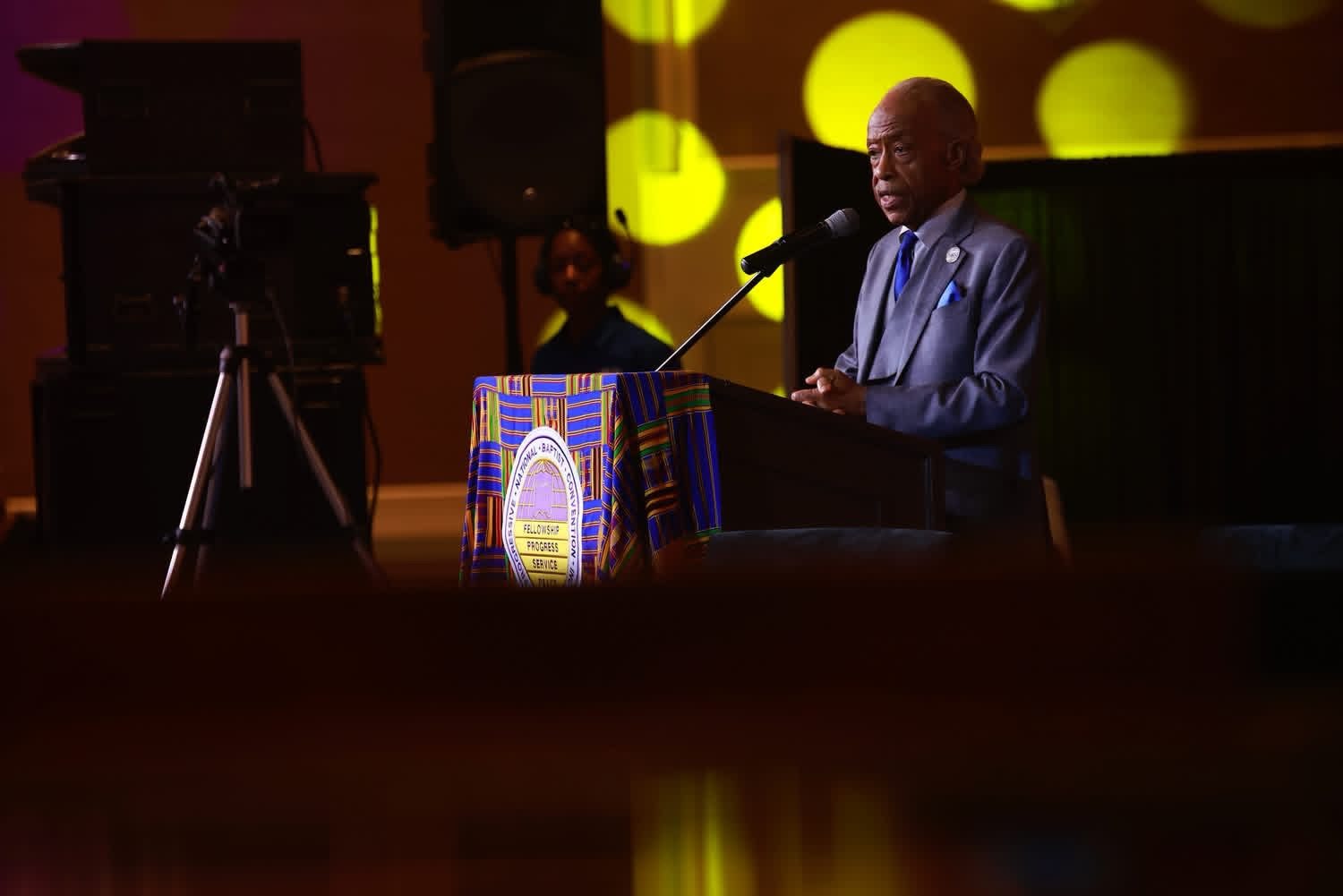 Rev. Al Sharpton at the podium during the 65th Annual Session